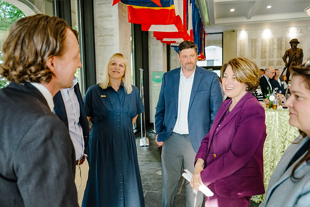 PBPC Members congratulate Sen. Amy Klobuchar (D-MN) on receiving the Congressional Bioeconomy Champion Award during an evening reception on Capitol Hill.
